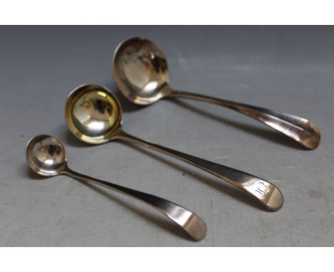 THREE HALLMARKED SILVER LADLES, consisting of a ladle by Smith &amp; Fearn - London 1792, L 13 cm, a smaller Georgian example