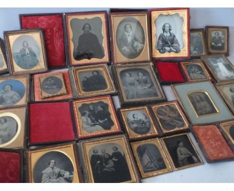 A COLLECTION OF VICTORIAN MINIATURE PORTRAIT PICTURES FRAMES, to include leather bound travelling frames, daguerreotypes and 