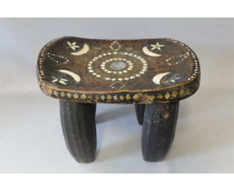 A WEST AFRICAN TRIBAL ART SENUFO IVORY COAST STOOL, with decorative bone inlays