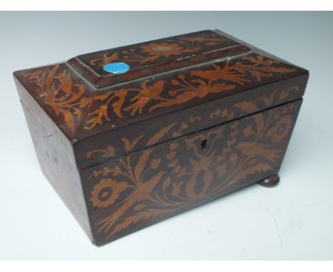 A 19TH CENTURY ROSEWOOD INLAID TEA CADDY, of sarcophagus form, the lid opening to baize lined interior, raised on squat bun f