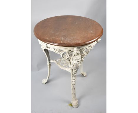 A Late Victorian Cast Iron based Circular Topped Pub Table, Extended Cabriole Supports with Claw Feet, Stretcher Shelf Intact