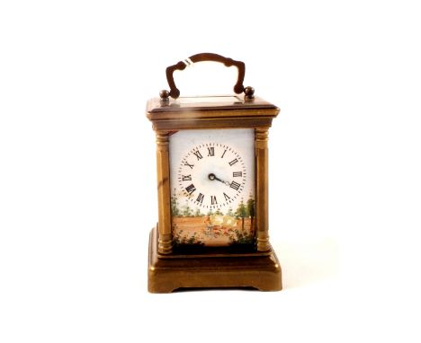 A miniature carriage clock with porcelain panels (missing front glass)