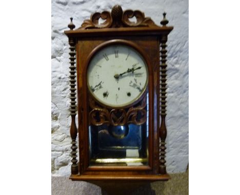 A Victorian Walnut Vienna Type Wall Clock, together with an Oak cased American mantel clock