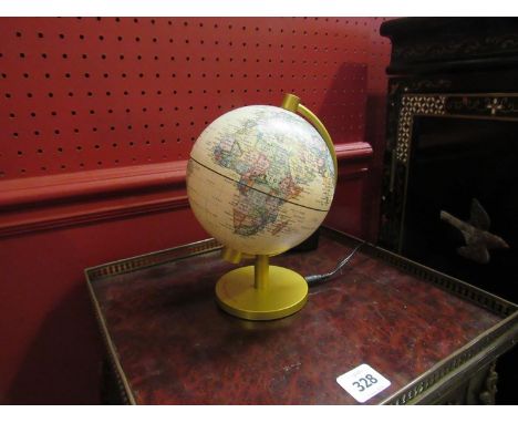 A small light-up world globe lamp