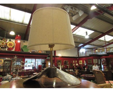 A propeller converted to a table lamp 