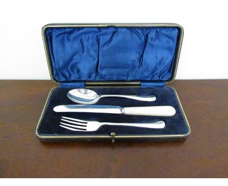 A George Bishop & Sons cased Christening set, spoon, fork and mother-of-pearl handled knife, Sheffield 1933, 60g (130g includ
