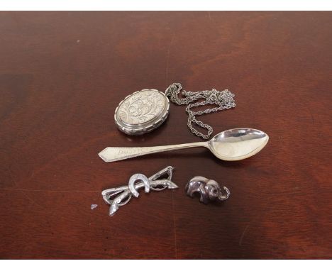 A locket on sterling silver chain, equestrian bar brooch, 925 elephant brooch and teaspoon