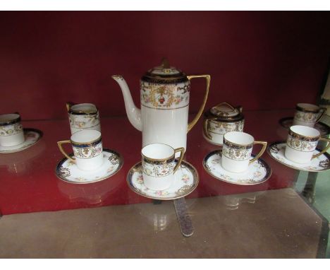 A Noritake coffee set, white ground gilt and floral decoration