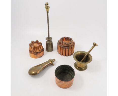 A collection of metalware, to include a brass door stop, a brass powder flask, brass pestle and mortar, two jelly moulds etc