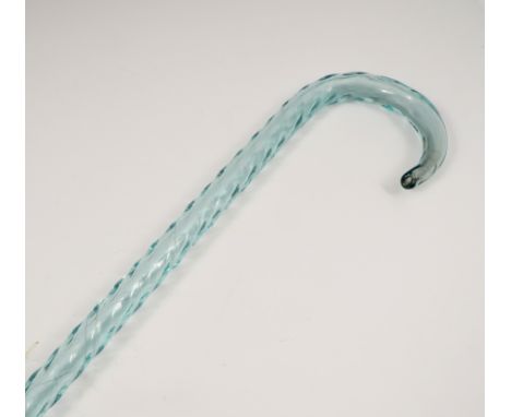 A pale blue glass walking stick, with twist decoration, height 35ins   Condition report:  Tips are not straight, more rounded