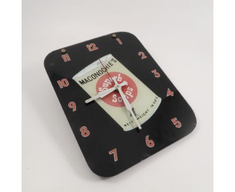 A glass advertising clock, Maconochie's Superb Soups, of rectangular form with rounded corners, printed with a can of soup to