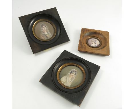 A 19th century circular portrait miniature, painted on ivory of a woman wearing a crown and headdress, signed Gerard, diamete