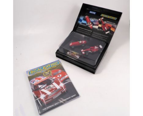 A boxed Scalextric set, celebrating 50 years, containing Ferrari 375 F1 and a Ferrari 248 F1 2006
