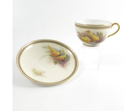 A Royal Worcester cup and saucer, decorated with the Australian Wattle flower by R Austin, titled to base, dated 1926, retail