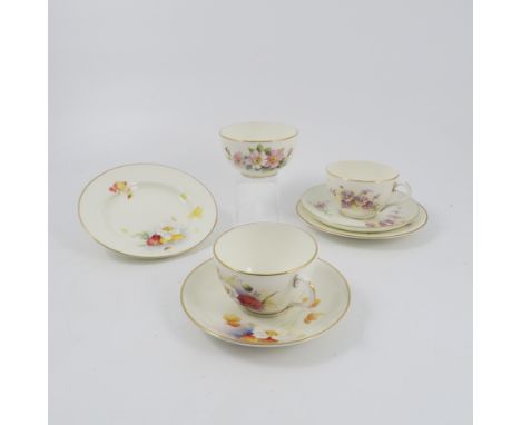 A Royal Worcester part tea service, comprising five cups, five saucers, five side plates, jug, sugar bowl and for shallow bow