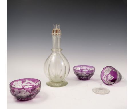 A 19th century glass four section decanter, of baluster form, with four glass stoppers to the top, height 12ins, together wit