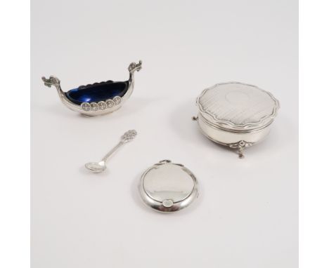 A Norwegian silver salt, formed as a Viking boat, with blue glass liner, together with a condiment spoon, silver ring box, of