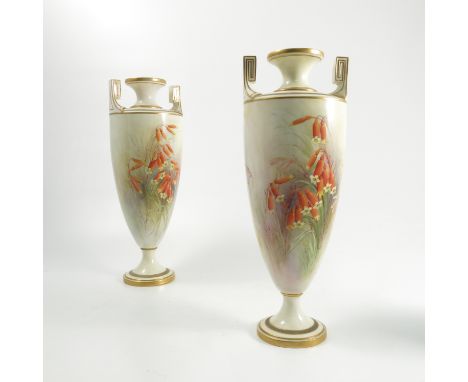 A pair of Royal Worcester vases, decorated with the Austlian Xmas Bells flower by R Austin, with Greek Key handles and pedest