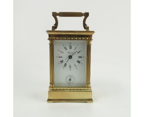 An Aspreys brass carriage clock, with subsidiary dial, height including handle 6ins  