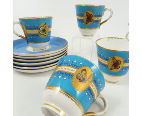 A set of six Royal Worcester cups and saucers, with blue ground decorated with oval reserves of insects to a gold ground, wit