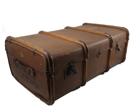 A travelling trunk, marked Fletcher, with wooden studded bands, length 35.5ins 