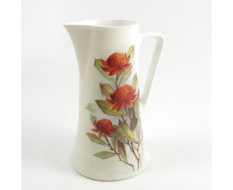 An un-marked jug, decorated with the Australian flowers Waratah by R Austin, af, height 6.25ins   Condition report:  Crazed a