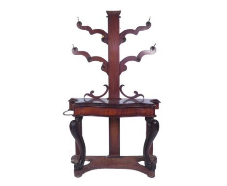 A 19th century mahogany serpentine front hall stand, fitted with hooks and two stick stands, width 45ins   Condition report: 