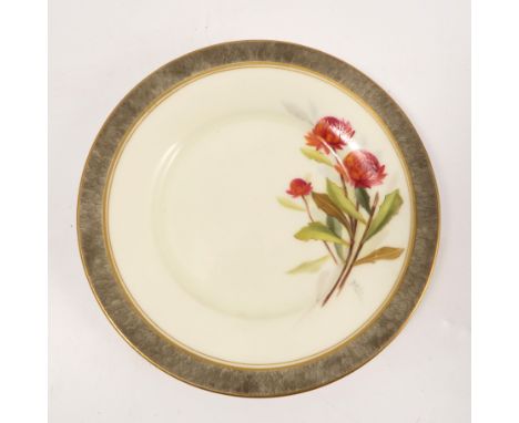 A Royal Worcester plate, decorated with the Australian Waratah flowers by E Phillips, the border with flowers to a grey groun