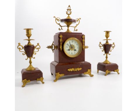 A 19th century French marble clock garniture, the striking movement stamped L Alliance Leforestier Paris, the case surmounted