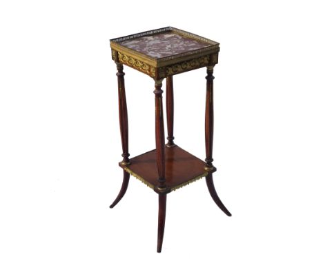 A marble topped plant stand, the square top with pierced gallery border raised on four reeded legs with splayed feet united b