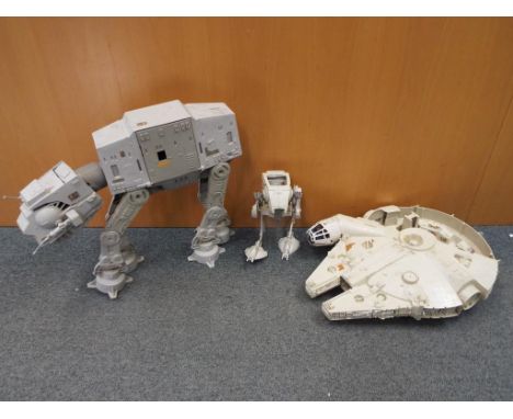 Star Wars - three vintage Star Wars vehicles to include a 1979 Millennium Falcon by Kenner, a 1981 AT-AT Walker by Kenner and