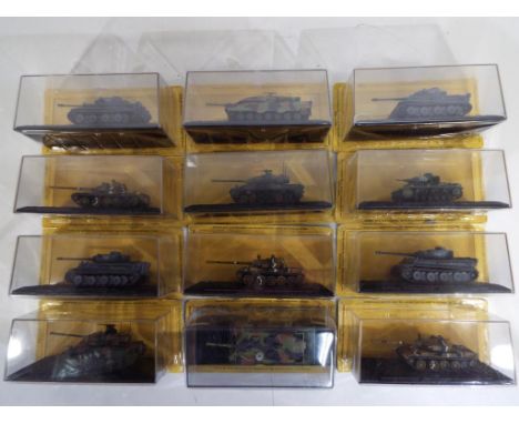 Diecast - twelve diecast model tanks from the Deagostini Combat Tanks Collection in original display boxes and blister packs,