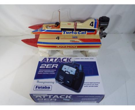 R/C boats - Robb Liqui Moly battery powered racing boat with Futaba 2 channel radio controller in box Est £20 - £40. [2] 