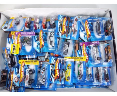 Hot Wheels - in excess of 70 diecast vehicles in original window boxes in m condition, includes some 40th anniversary models 