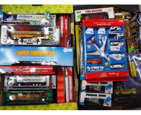 Diecast - a quantity of boxed diecast model motor vehicles and similar, predominantly trucks and commercial vehicles, models 