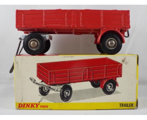 Dinky - a 428 Trailer with Bogie wheels, pivot and movable trailing arm, item m in e to nm box Est £30 - £50
