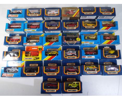 Matchbox - 32 diecast vehicles in original window boxes comprising MB2 Rover Sterling, MB22 Saab 9000 Turbo, MB1 Jaguar XJ6 a