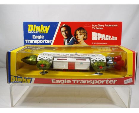 Dinky - Eagle Transporter from the Gerry Anderson TV series 1999, model appears m in e to nm box with slight imperfections. E
