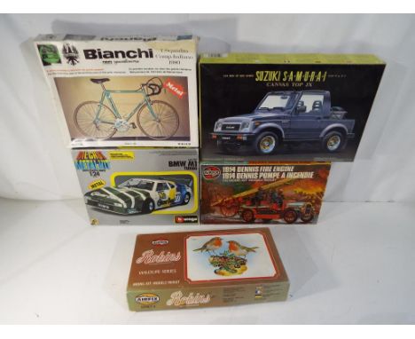 Model kits - five model kits to include a metal Bianchi Bicycle #174 by Prostar, a diecast metal kit 1:24 scale BMW M1Turbo #