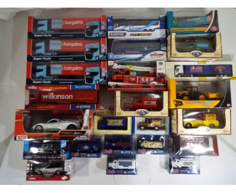 Diecast - a quantity of boxed diecast model motor vehicles predominantly commercial vehicles to include Corgi, Welly, Oxford 