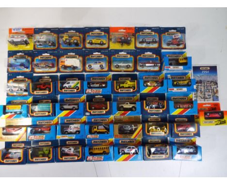 Matchbox - 43 diecast vehicles in original window boxes to include two Vauxhall Astras MB8 and MB48, a Dodge Challenger and s