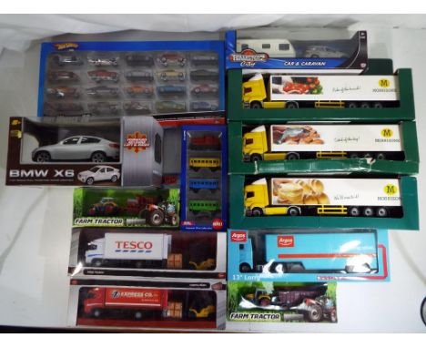 Diecast - a lot to include a quantity of diecast model motor vehicles comprising Hot Wheels, twenty car gift set, Siku gift s