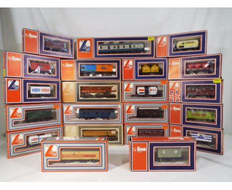 Model Railways - twenty one Lima OO gauge wagons in original boxes comprising 305356 parcel van and 305343 full brake van and