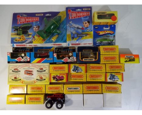 Matchbox - 32 diecast vehicles in boxes mainly from the 1980s comprising two limited edition Rally Vettes, a Hot Wheels Red L