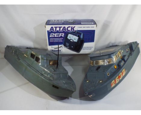 R/C boats - two plastic battery powered navy ships with Futaba 2 channel radio controller in box Est £20 - £40. [3] 