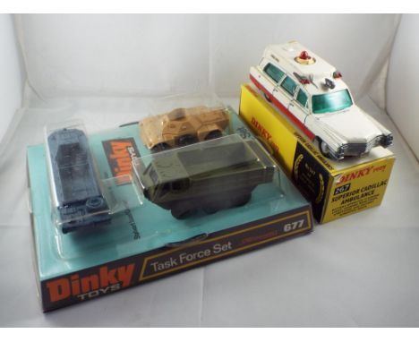 Dinky - two diecast vehicles in original boxes comprising 677 Task Force set, appears m in nm box and 267 Cadillac Ambulance 