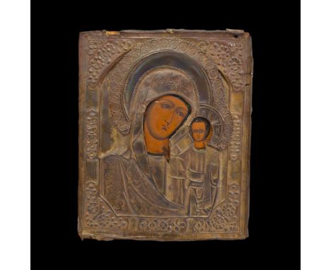 An antique Russian Orthodox icon of Mother Of God Kazanskaya. The hand painted icon with egg tempera, gesso, and levkas on a 