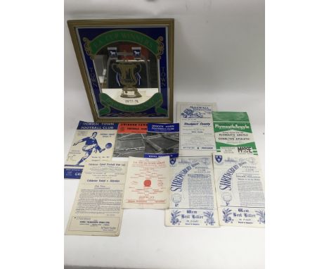 A collection of football, cricket and railway ephemera comprising an Ipswich Town wall mirror, football programs, cricket col