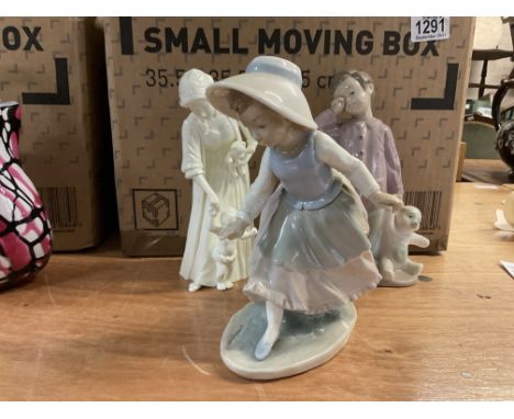 A collection of Royal Worcester and NAO porcelain figurines.