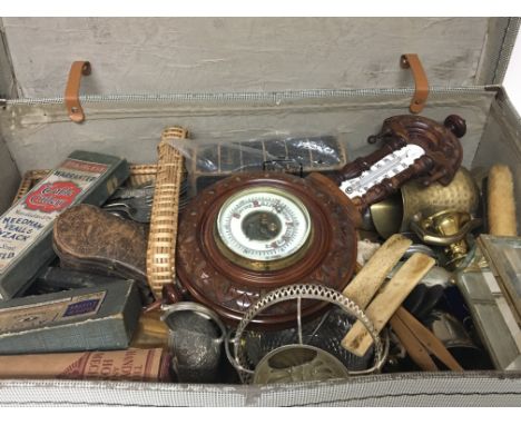 A case containing antique and vintage oddments. a walnut barometer silver plate brass books opera glasses (a lot)
